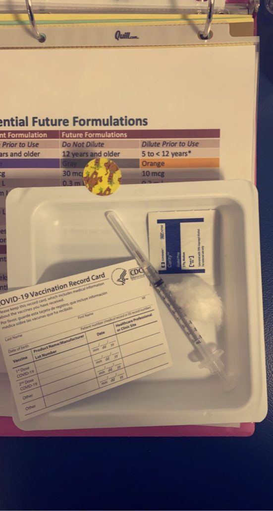 Child receiving COVID-19 vaccine — Spring Valley Pediatrics Washington DC